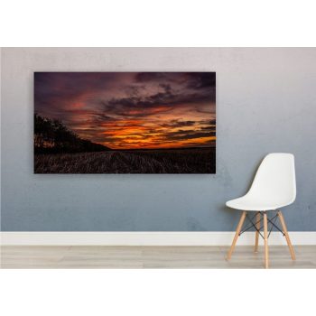 Vászonkép "Naplemente a tarlón"